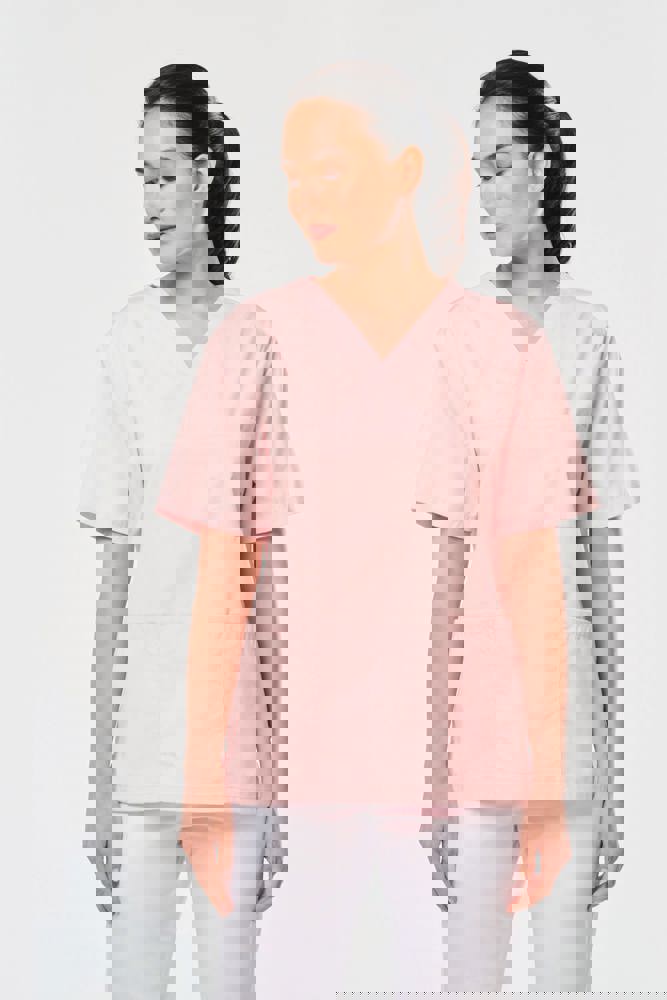 WK507C - Unisex tuniek met korte mouwen in polykatoen