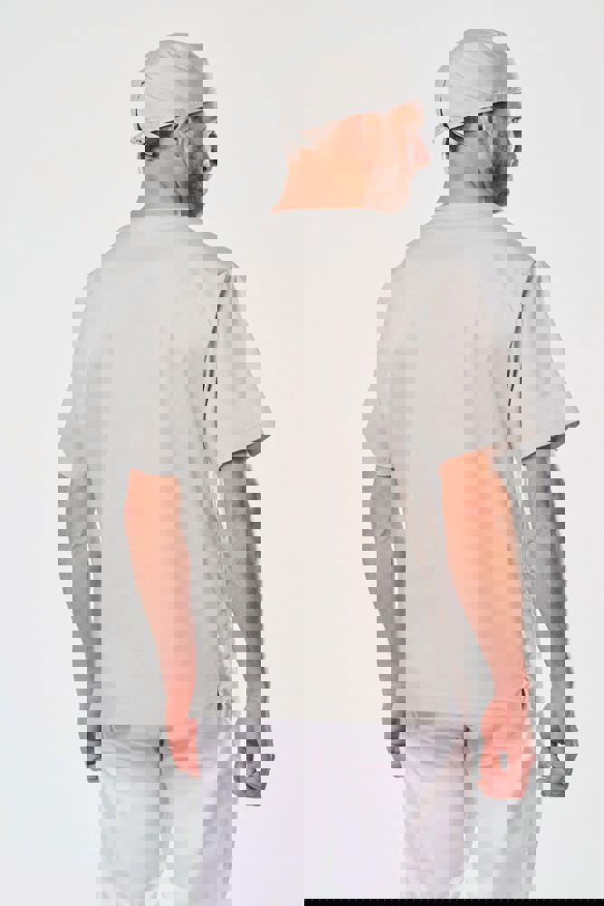 WK507C - Unisex tuniek met korte mouwen in polykatoen