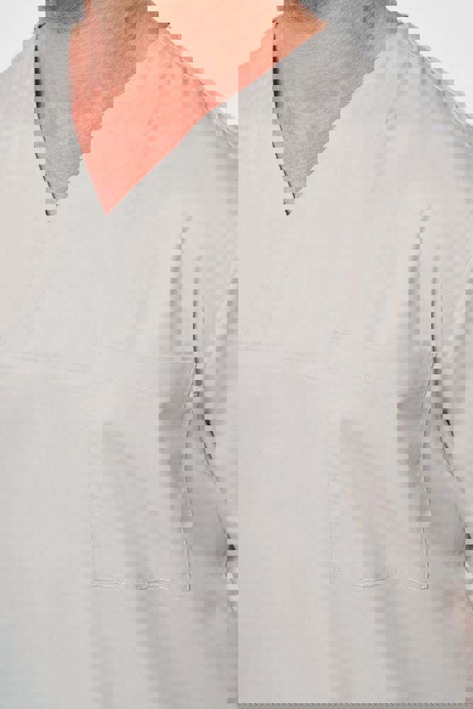 WK507C - Unisex tuniek met korte mouwen in polykatoen